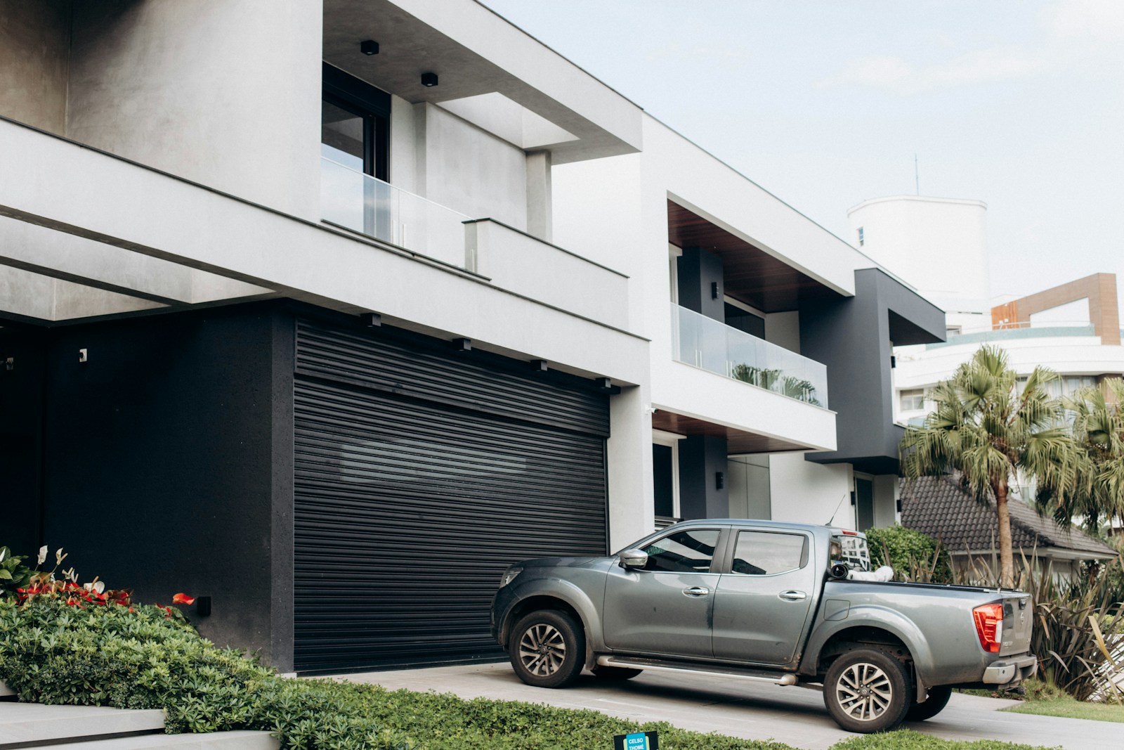 a truck is parked in front of a building, home & auto