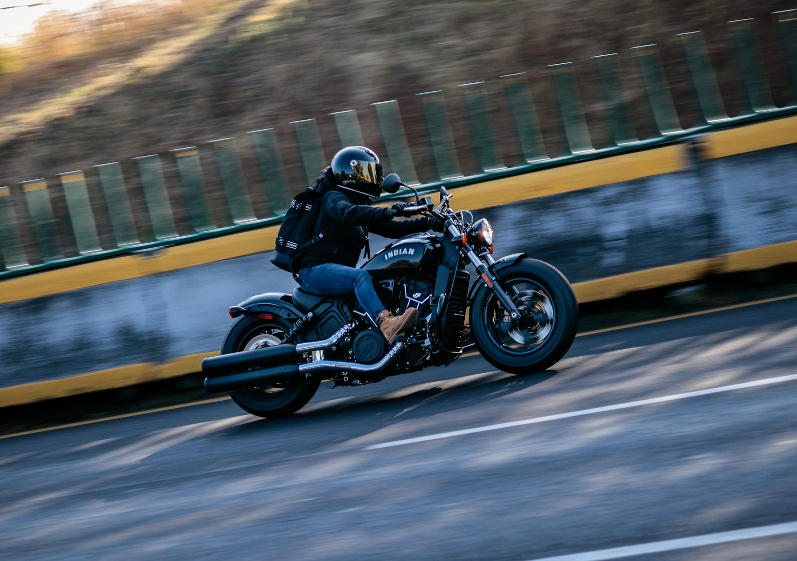 a man riding a motorcycle, motorcycle